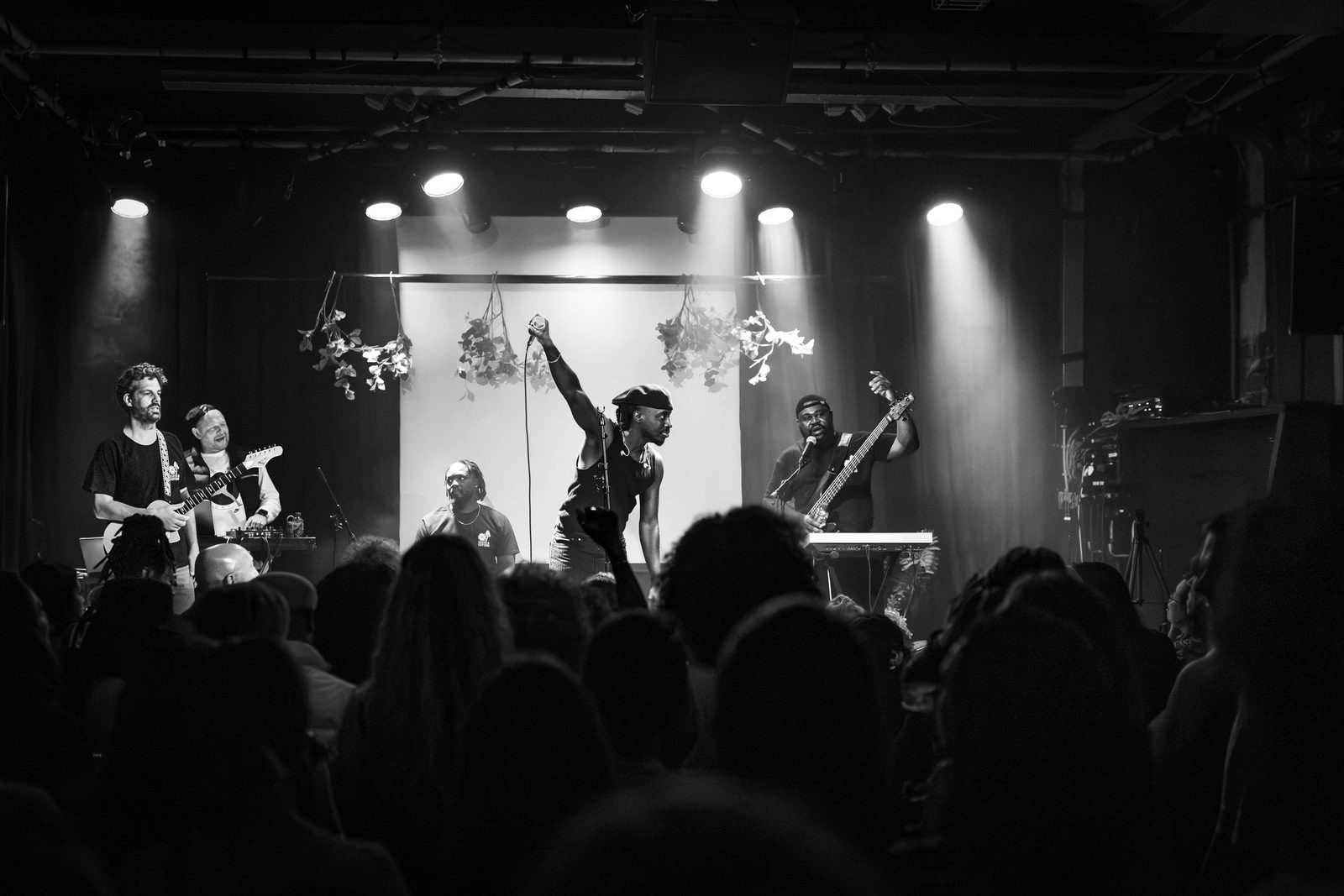 TMARO on stage, crowd in the foreground